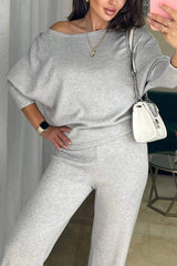 Női szett aszimmetrikus felsővel és lezser nadrággal